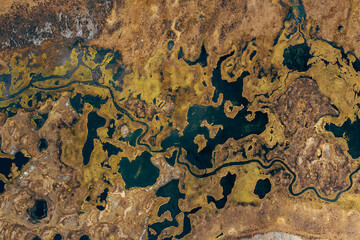 View from a drone to the lake and river in autumn
