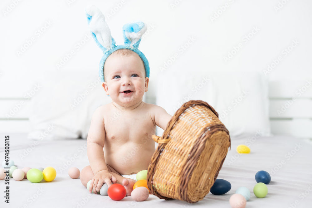 Wall mural happy caucasian baby girl six months old wearing bunny ears headband