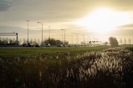 Cars driving on the A4 highway in the direction of Leiden the Netherlands.