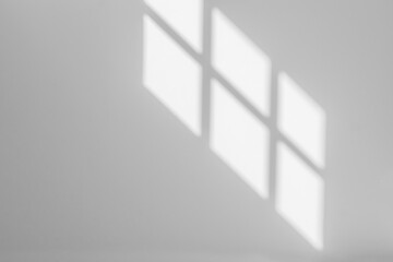 Gray shadow and light blur abstract background on white wall  from window. Architecture stripe dark shadows indoor in room  background