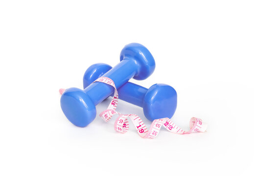 purple dumbbells and measuring tape on white background, isolated object