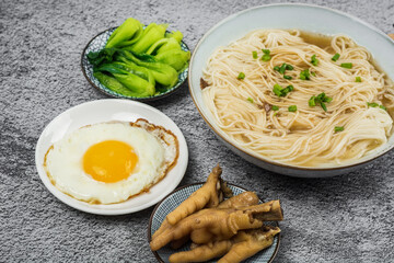 Noodles Soup with Fish Balls on wood table