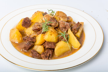 A pot of braised potato beef brisket