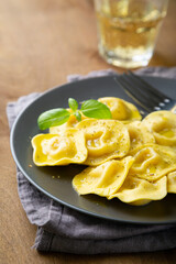 Boiled ravioli with fresh basil