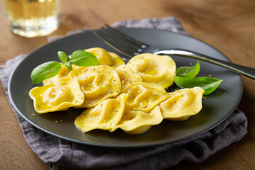 Boiled ravioli with fresh basil