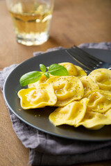 Boiled ravioli with fresh basil
