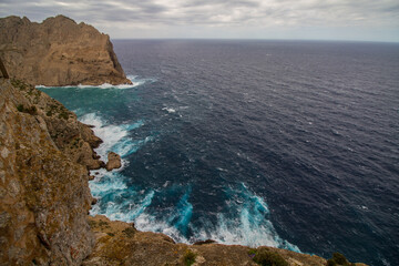 Cabo Formentor (Cape Formentor) at Mallorca, Spain, on a cloudy day in October, wild seascape, rough coastline, cliffs