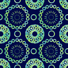 Seamless geometric pattern of mandalas, circles. Multicolored green ornament on a blue background, hand-drawn. Retro style. Design of the background, interior, wallpaper, textiles, fabric, packaging.