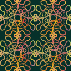 Seamless geometric pattern. Multicolored ornament on a green background, hand-drawn. Oriental, ethnic motifs. Design of background, wallpaper, textiles, fabric, packaging.