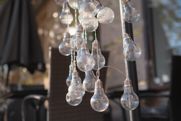 many bright bulbs on the street decorations