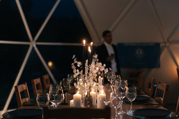 A festive table set for a wedding in a restaurant