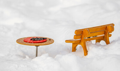 miniature furniture in the snow