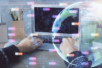 Double exposure of woman hands working on computer and world map hologram drawing. International technology business concept.