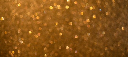background of abstract gold glitter lights