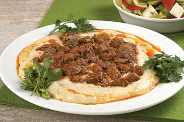 Turkish Food Hunkar Begendi made with Eggplant and Meat.