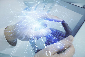 Obraz premium Multi exposure of man's hand holding and using a digital device and data theme drawing. Innovation concept.