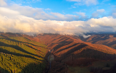 Naklejka premium sunset over the mountains