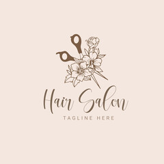 Hair salon logo with scissor and floral illustration