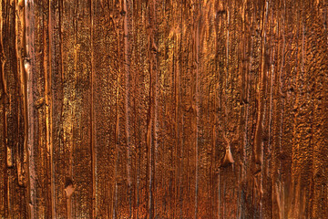 Fototapeta na wymiar texture of solidified bronze or gold metal with drips and drops