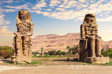 The Colossi of Memnon statues of the Pharaoh Amenhotep, Theban Necropolis, Luxor, Egypt