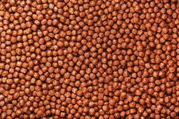 Ready breakfast chocolate balls texture close-up, background