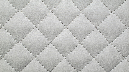 eco leather background with checkered stitching