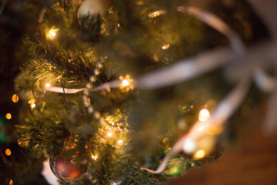 Christmas tree with lights and decorations with soft focus