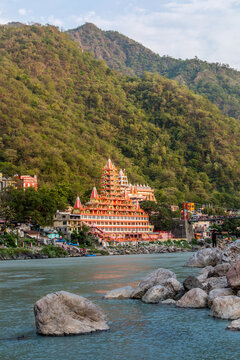 View of Ganga river embankment, Lakshman Jhula bridge and Tera Manzil Temple, Trimbakeshwar in Rishikesh