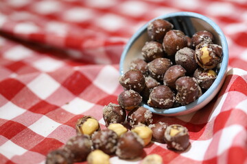 Various Nuts and dried fruits in wooden bowls