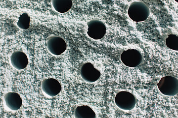 porous poriferous material for air ventilation with holes	