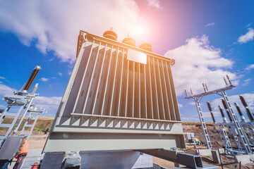 Construction of a power transmission substation on a background of blue sky