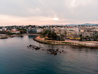 Drone shot of the old city of Antibes. Cote d'Azur of the Mediterranean Sea of ​​France. Resort on the French Riviera Antibes. Picasso Museum. View from the drone yachts moored in the city marina.