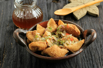 Tahu Gejrot Cirebon. Traditional Street Food Made from Fried Tofu (Bean Curd) with Crushed Shallot and Green Chili in Sweet Soy and Sugar Sauce. Typically Food from Cirebon, West Java.