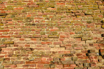 Brick wall. Retaining wall made of red brick.