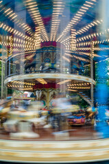 Moving carousel, colorful background