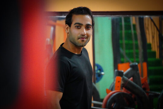 Men in gym at morning gym and fitness concept