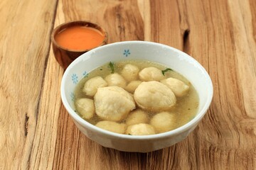 Cilok Kuah Bakso with Chilli Chopped Inside, Spicy Meatball Cilok in a Blue Bowl