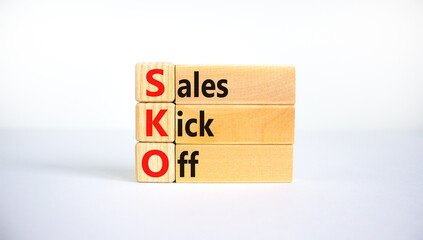 SKO sails kick off symbol. Concept words SKO sails kick off on wooden blocks. Beautiful white background, copy space. Business and SKO sails kick off concept.