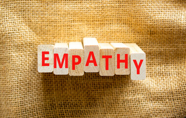 Empathy symbol. The concept word Empathy on wooden blocks. Beautiful canvas background, copy space. Business, psychological and empathy concept.