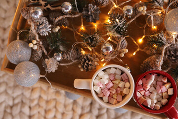 Cups of marshmallow on a wooden tray, Christmas table