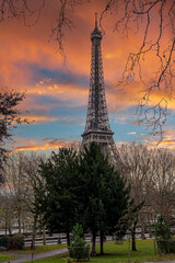 Beautiful view of the famous Eiffel Tower in Paris, France during magical sunset. Best Destinations in Europe - Paris.