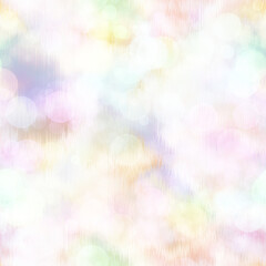 Seamless pale pastel tie dye bokeh texture. Soft tone on tone summer repeat background with washed out sun bleached ink dyed effect. 