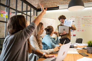 Group of young creative business brain storm meeting presentation,discussing roadmap to product...