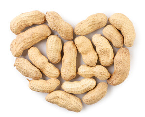 Peanuts not peeled in the shape of a heart on a white background, isolated. Top view