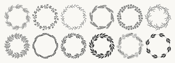 Set of floral round frames. Vintage plant wreaths with leaves and branches. Laurel wreaths. Decorative hand drawn elements for design