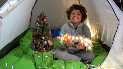 Europe, Italy , MIlan , Boy child 7 years old  Christmas lifestyle family at home - celebrate...