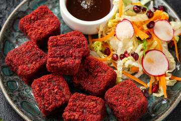 Beetroot and hazelnut bites with pomegranate glaze, vegetarian, vegan party finger food