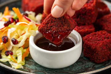 Beetroot and hazelnut bites with pomegranate glaze, vegetarian, vegan party finger food