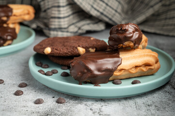 Dark chocolate coated half digestive biscuit with chocolate cookies and chips for loved ones valentines day celebration.