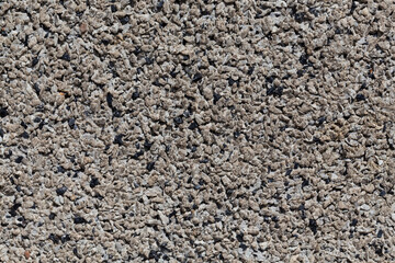 Crushed granite stones wall - close up